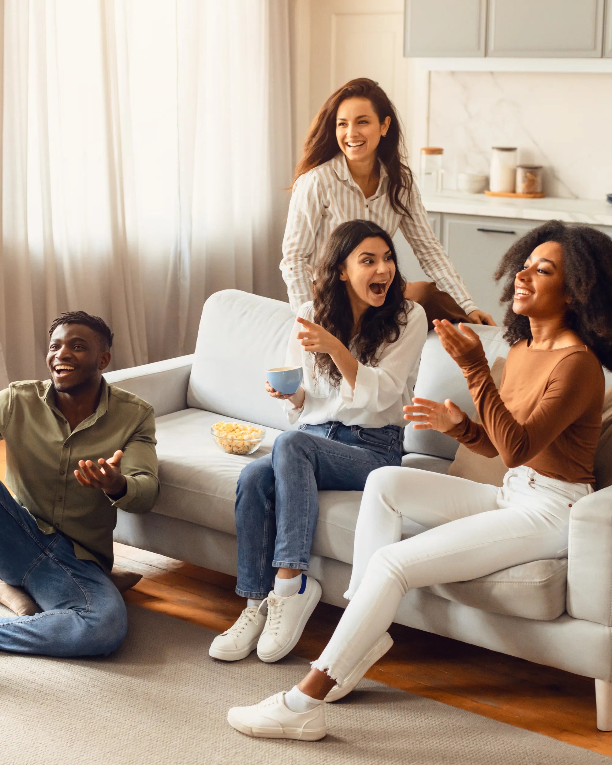 Group of People Laughing While Playing a Social Game
