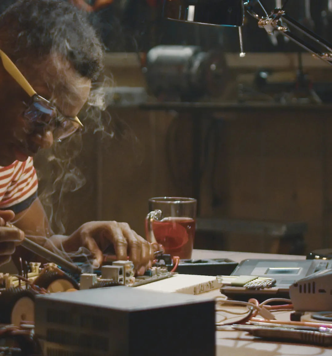 Man Soldering Board