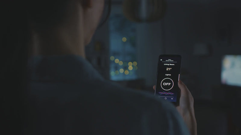 Woman Using Voice Control to Turn On Lights