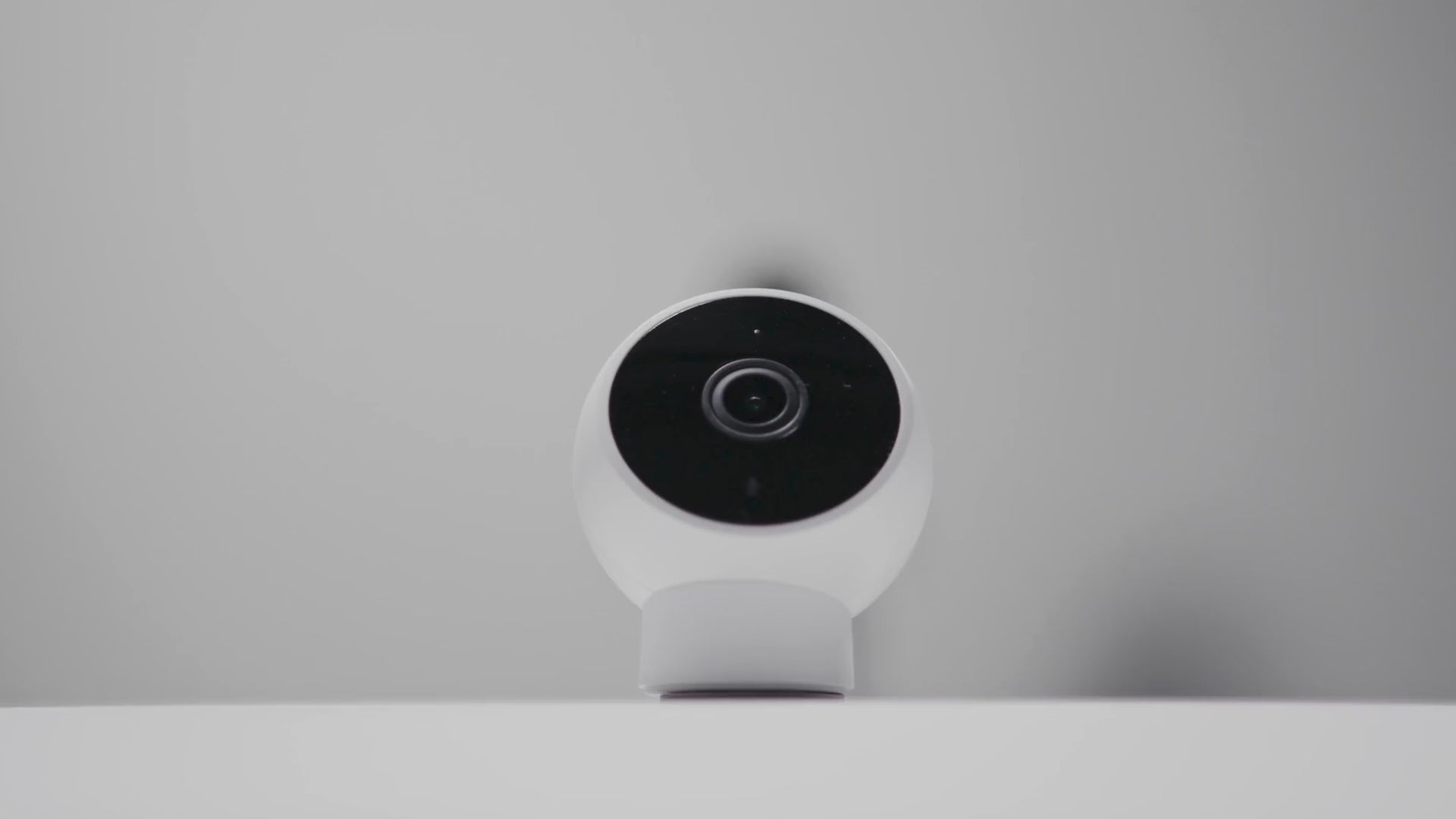 Load video: Person Moving Smart Camera while Child Standing In Background With A Phone