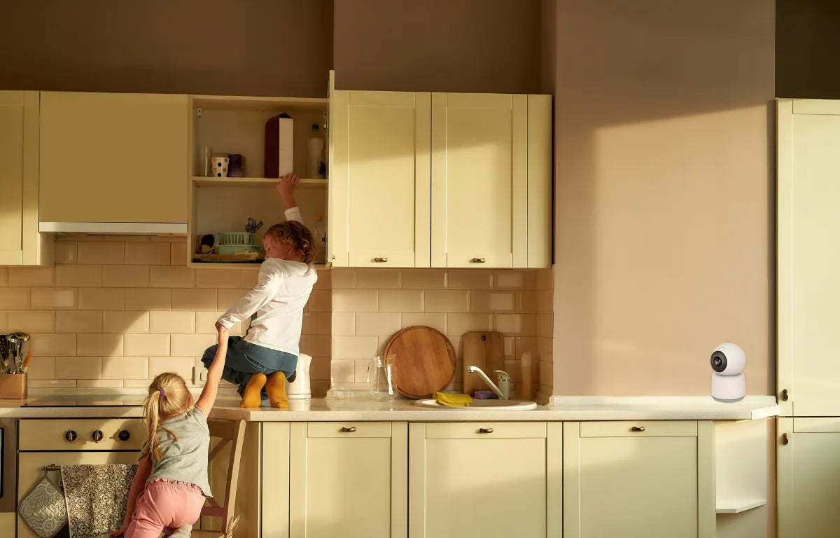 Two Kids Using Chair to Get On Kitchen Counter While Smart Camera is Watching Their Every Move
